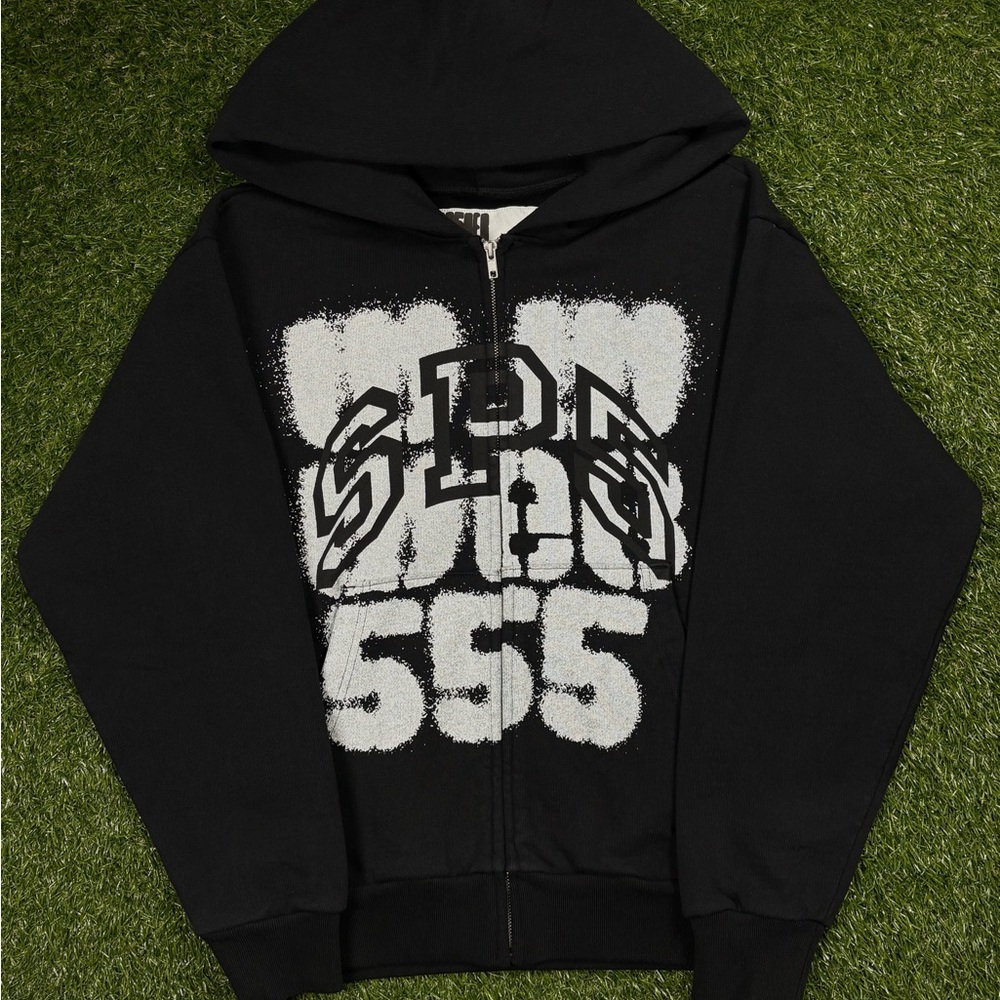 BLACK SP5DER SPRAY ZIP
HOODIE